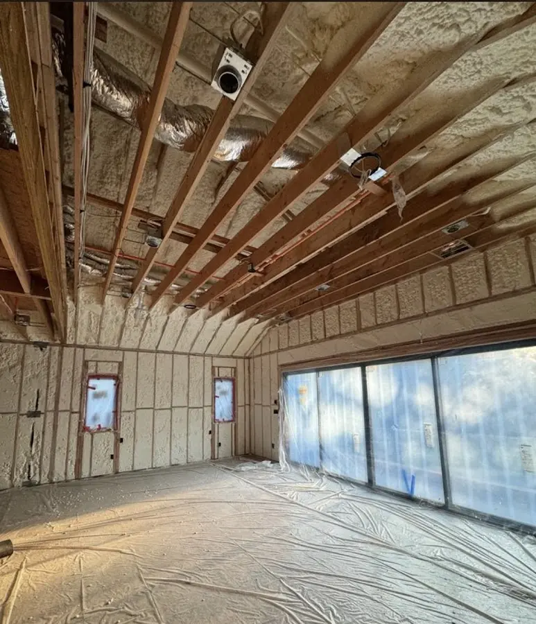 Interior walls and ceiling insulated with spray foam during new construction in Florissant